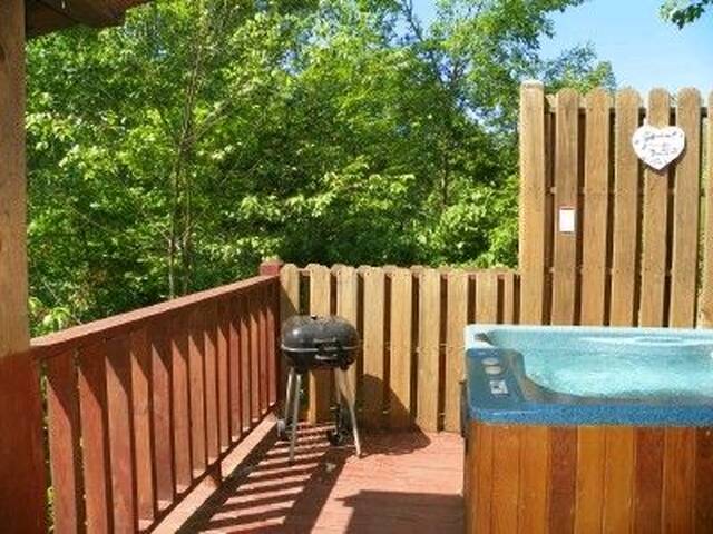 Charcoal grill  on hot tub deck