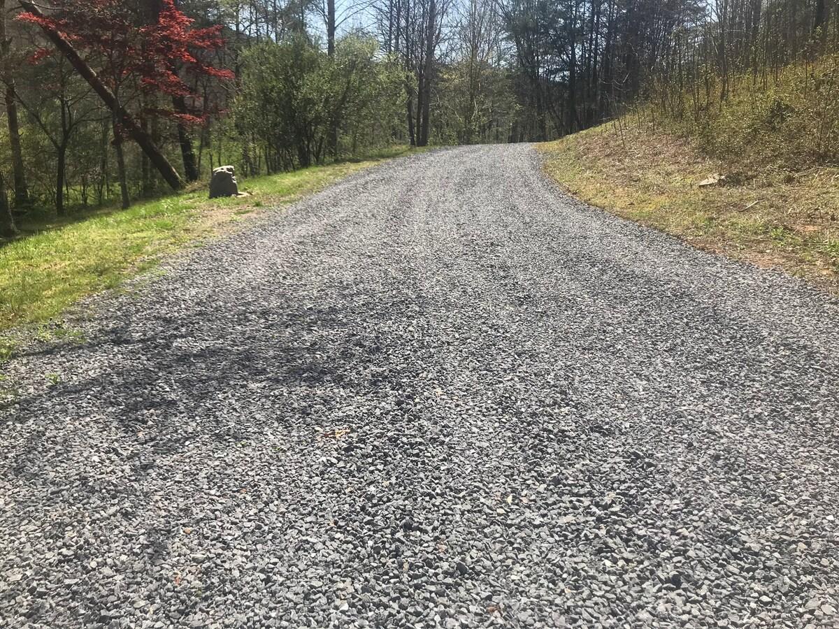 Gravel parking on side of house (overflow)