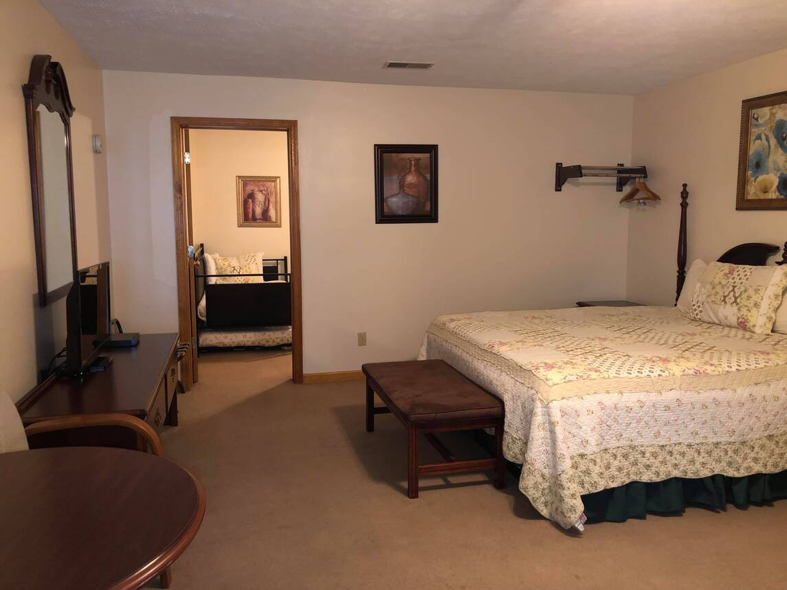 Motel Room with Fireplace and King Bed