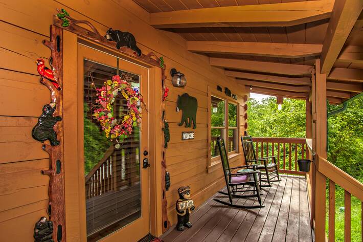 Front porch, front door, two wooden rocking chairs