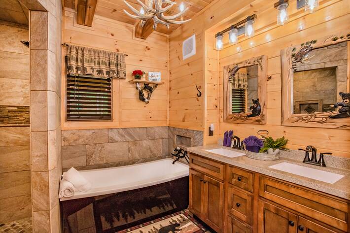 master suite bathroom, stone walk-in shower, deep soak tub, double sink vanity 