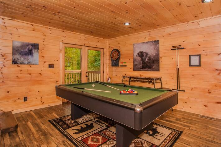 downstairs family room, dark wood and green pool table, 
