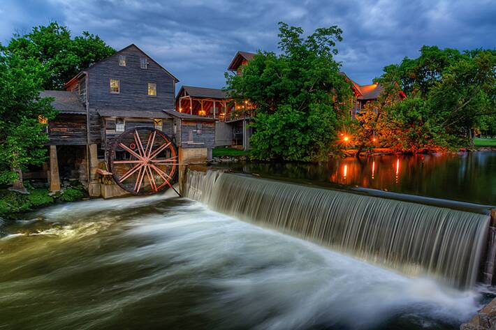 Historic Old Mill Restaurant overlooking the river and waterfall
