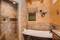 Master suite bathroom, stone walk-in shower, deep soak tub