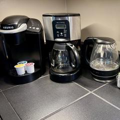 Keurig, drip-style coffee maker and hot water kettle on the counter