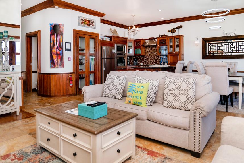 Spacious living room with comfortable seating, stylish décor, and an inviting gathering space.