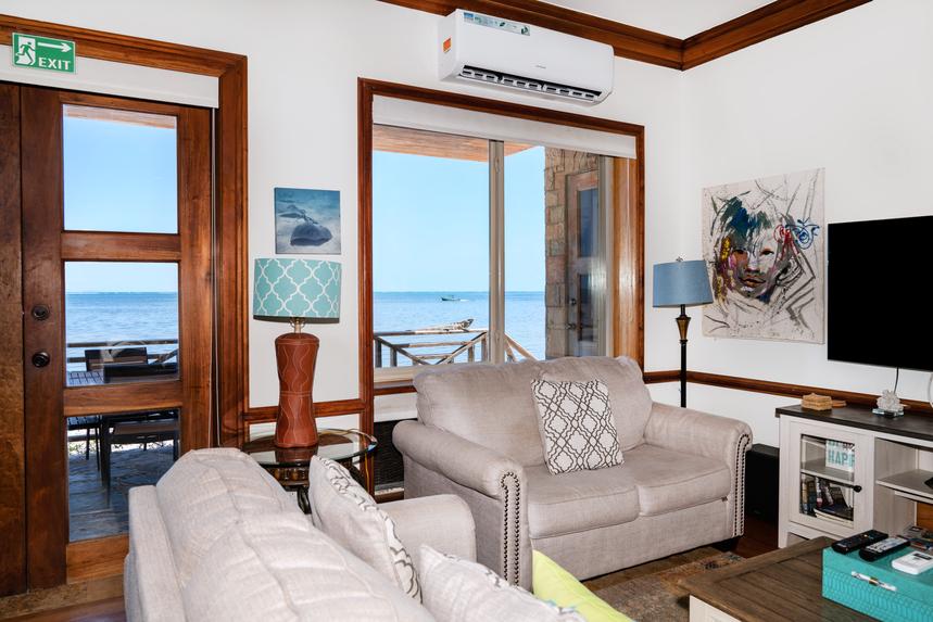 Spacious living room with comfortable seating, stylish décor, and an inviting gathering space.