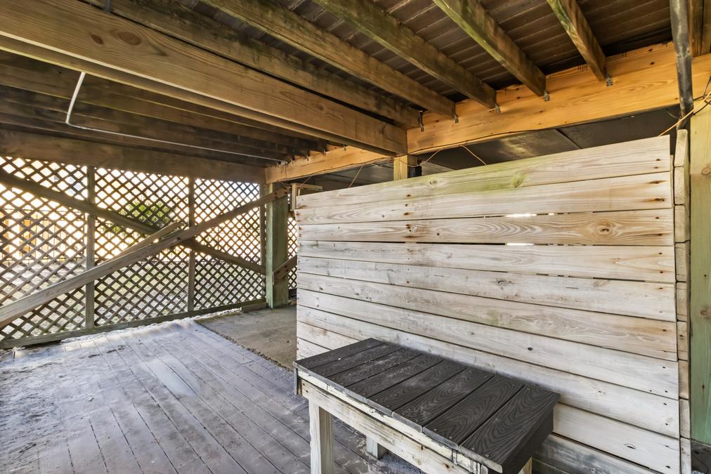 2 Car Covered Carport with Stocked Beach Closet