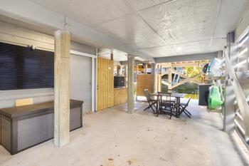 Carport with stocked beach closet