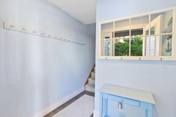 Carpeted stairs from your foyer to the main level