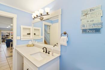 Guest bathroom with updated fixtures and countertops