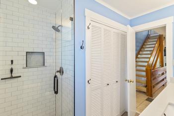 Guest bathroom on the main level with a new tile shower
