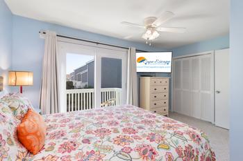 Closet storage, Large Smart TV and Private Balcony in Queen Suite