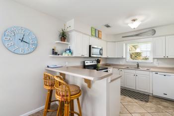 Well-Equipped Kitchen with sits 2 at the bar