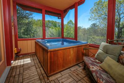 Sunset View Chalet screened in back deck with hot tub