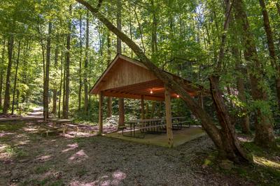 Caney Creek Mountain Area community pavilion with picnic tables