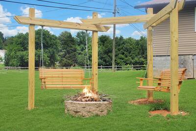 Rustic Acres outdoor fire pit with swings