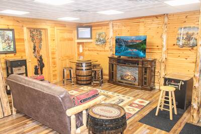 Creekside Lodge lower level multipurpose room with 55-inch flat screen TV