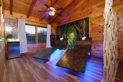Spa Dee Dah upper level loft area with heated spa chairs with ambient lighting