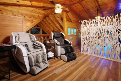 Spa Dee Dah upper level loft theater area with massaging chairs