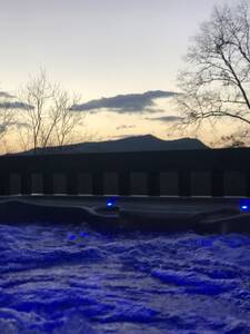 Majestic Poolside Lookout hot tub at dusk