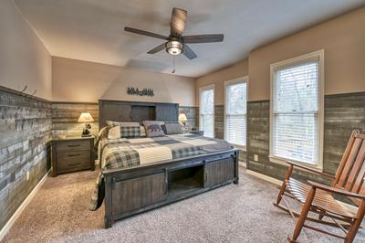 The Playful Bear main level bedroom with king size bed