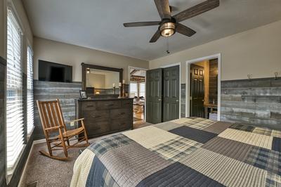 The Playful Bear main level bedroom with rocking chair