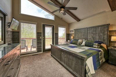 The Playful Bear main level bedroom with king size bed