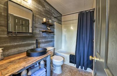 The Playful Bear main level bathroom with tub/shower combo