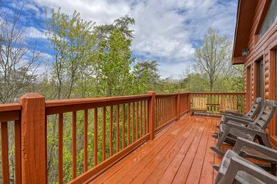 The Playful Bear main level back deck with rocking chairs