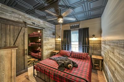 The Playful Bear lower level bedroom with king size bed