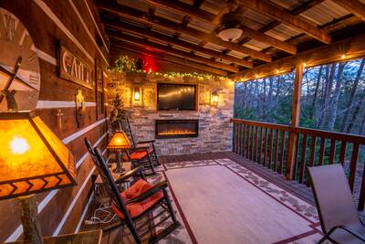 Mountain Magic covered back deck with year-round electric fireplace and 50-inch smart TV