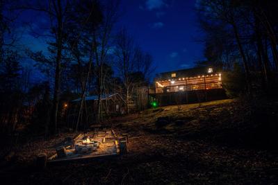 Mountain Magic outdoor fire pit at night