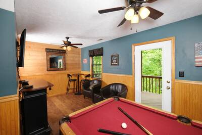 Just Hanging Out lower level game room with pool table