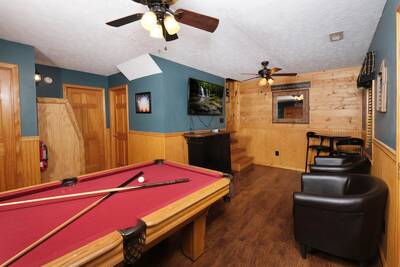 Just Hanging Out lower level game room with pool table