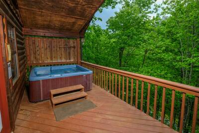 Just Hanging Out lower level covered deck with hot tub