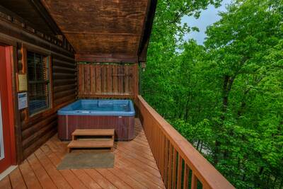 Just Hanging Out lower level covered back deck with hot tub