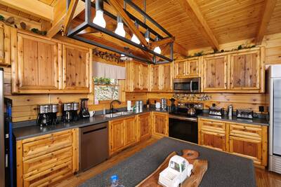 Katies Lodge fully furnished kitchen with stainless steel appliances