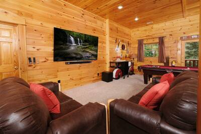 Katies Lodge lower level game room with 85-inch TV with Surround Sound