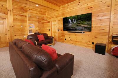 Katies Lodge lower level game room with 85-inch flat screen TV
