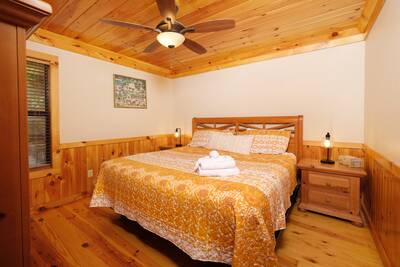 Treeside main level bedroom 1 with king size bed