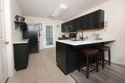 Big Foots River Retreat fully furnished kitchen with stainless steel appliances and granite countertops
