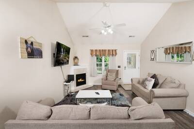 Big Foots River Retreat living room with 55-inch flat screen TV