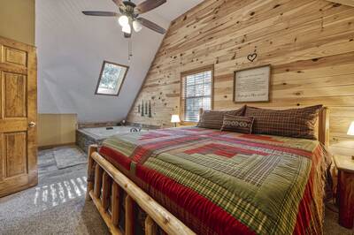 Forest Hollow upper level bedroom with king size bed