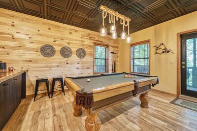 Forest Hollow lower level game room with pool table