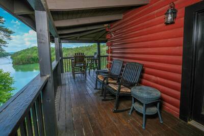 Smoke on the Water - Covered wrap around deck with rocking chairs