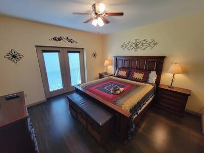 Pigeon Forge Condo Getaway - Bedroom with king size bed
