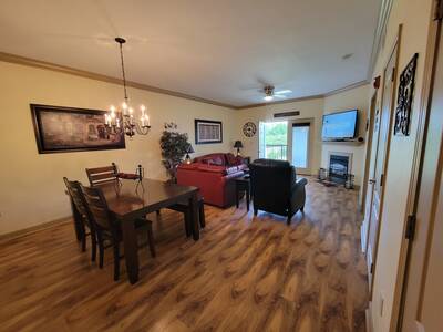 Pigeon Forge Condo Getaway - Dining area and living room