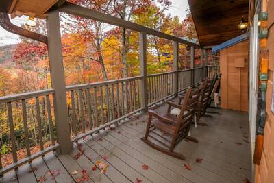 Campfire Lodge - Covered wrap around deck with rocking chairs