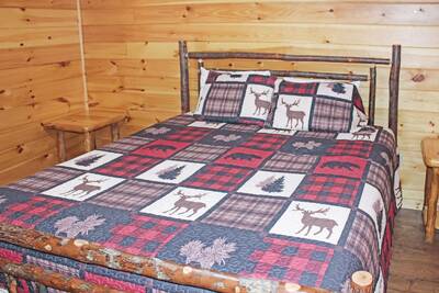 Timber Tree Lodge lower level bedroom with king size bed